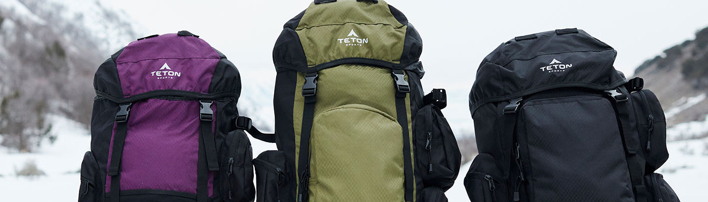 TETON Sports Scout & Explorer backpacks in a snowy setting.