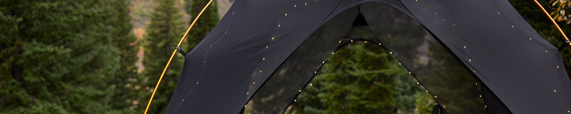 A TETON Sports Mountain Ultra tent decorated with holiday lights