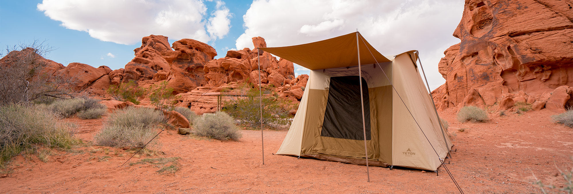 Live Large: Image shows a TETON Sports Mesa Canvas Tent setup in the red rock desert of southern Utah. 